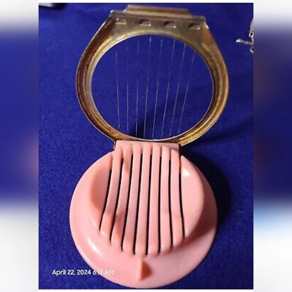 Retro Pink Egg Slicer with Metal Frame